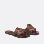 Mules planos de piel estampado serpiente